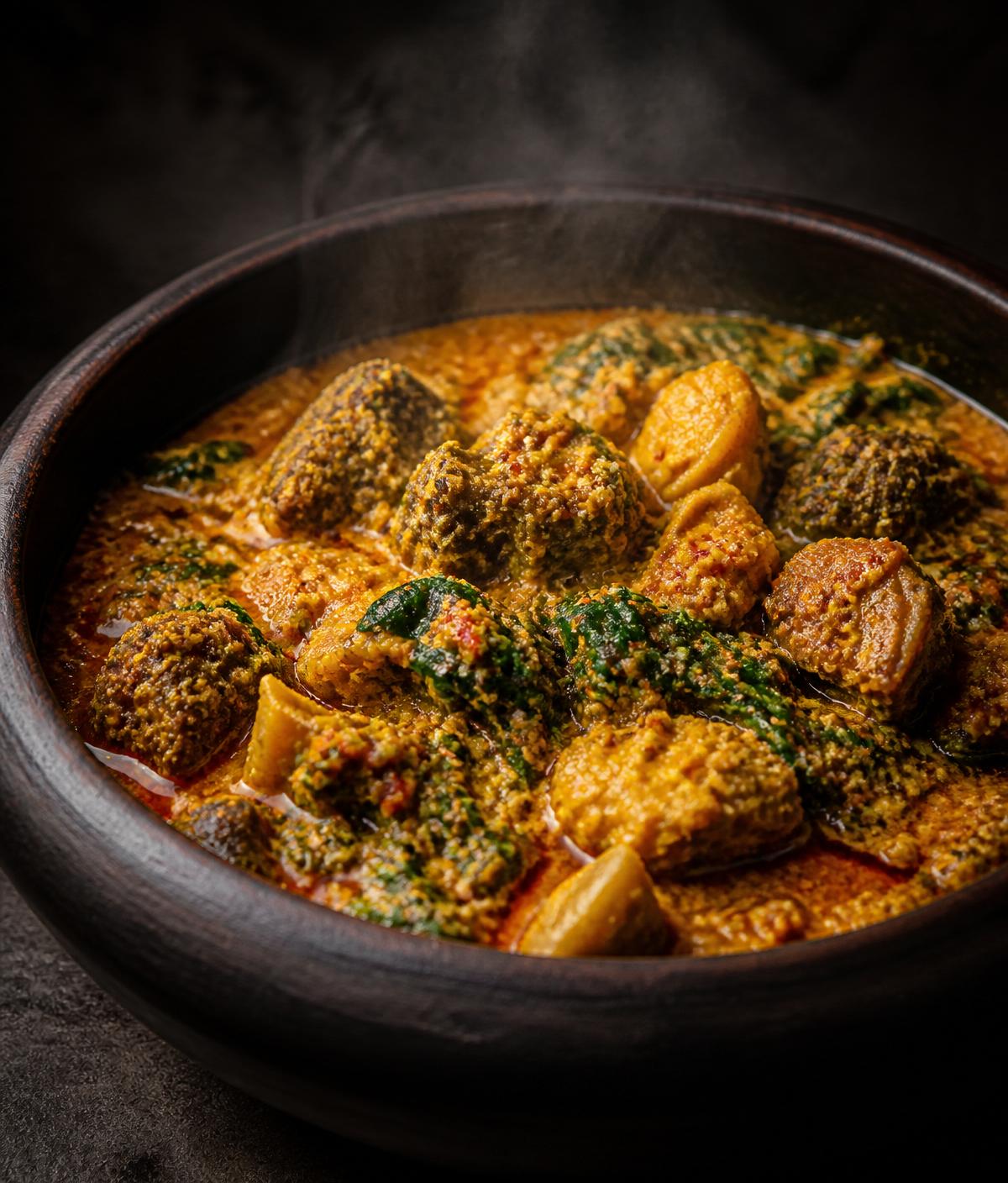 Steaming bowl of Nigerian egusi soup